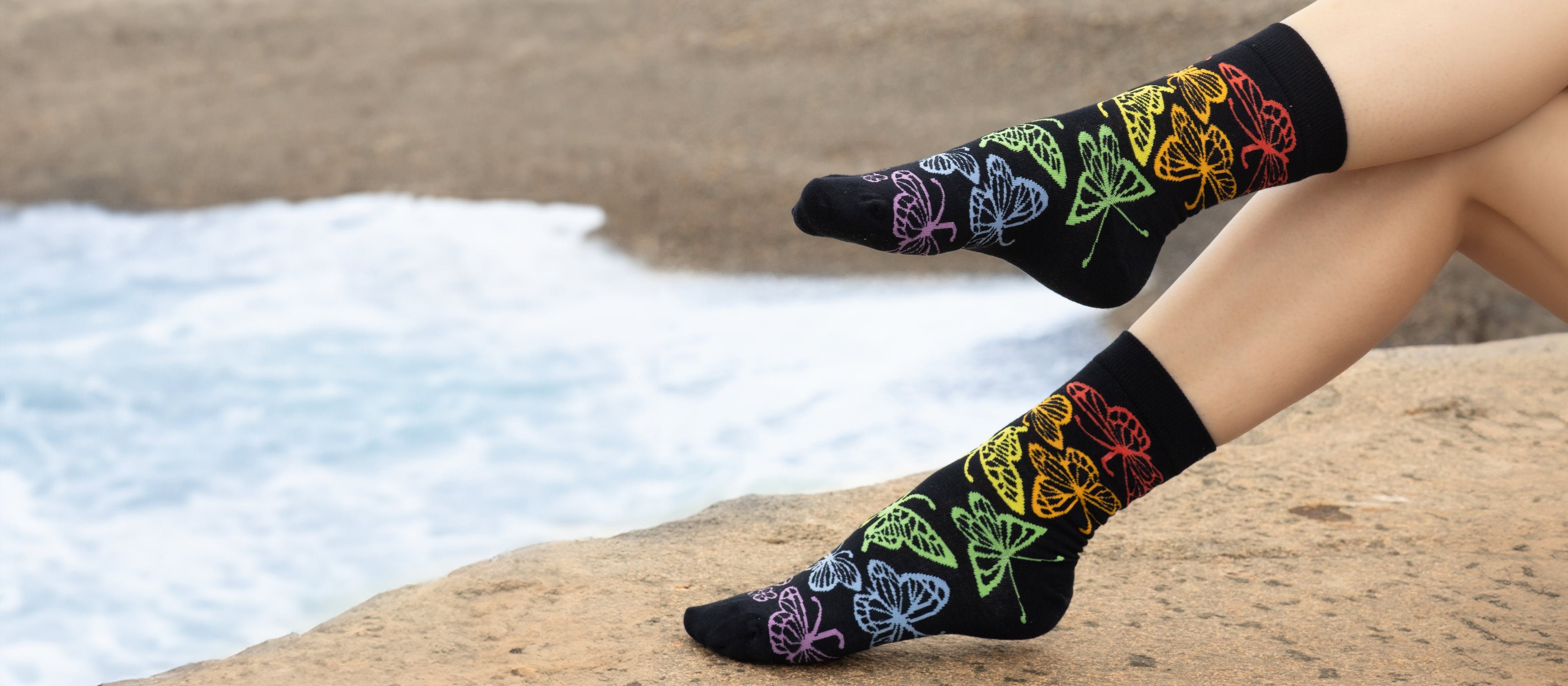 Women's Bamboo Crew Socks Collection, Featuring Rainbow Butterfly Bamboo Crew Socks with Beach Background